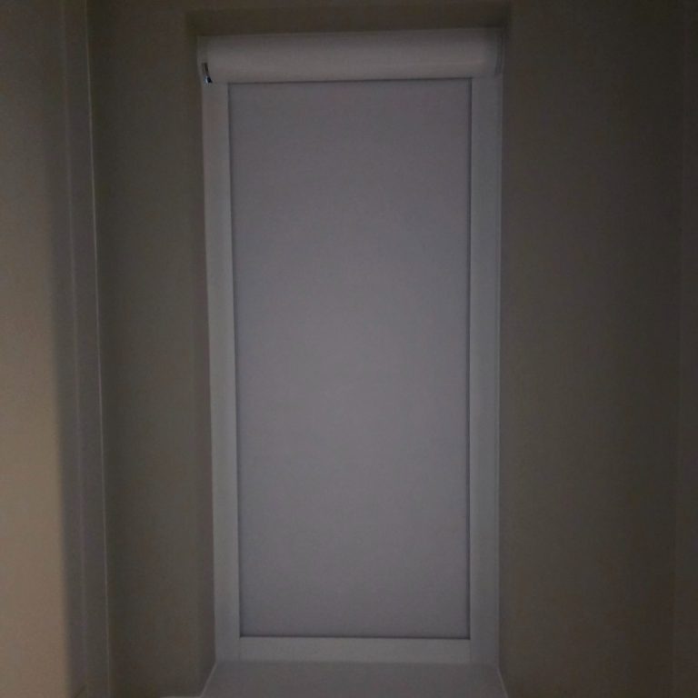 Full blackout motorised Louvolite roller blind Cassette full blackout motorised Louvolite roller blind expertly fitted by TrueShade Interiors