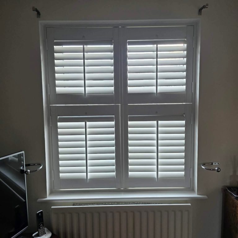 Made to measure tier on tier shutter Made to measure tier on tier shutters for a living room window measured and isntalled by TrueShade Interiors