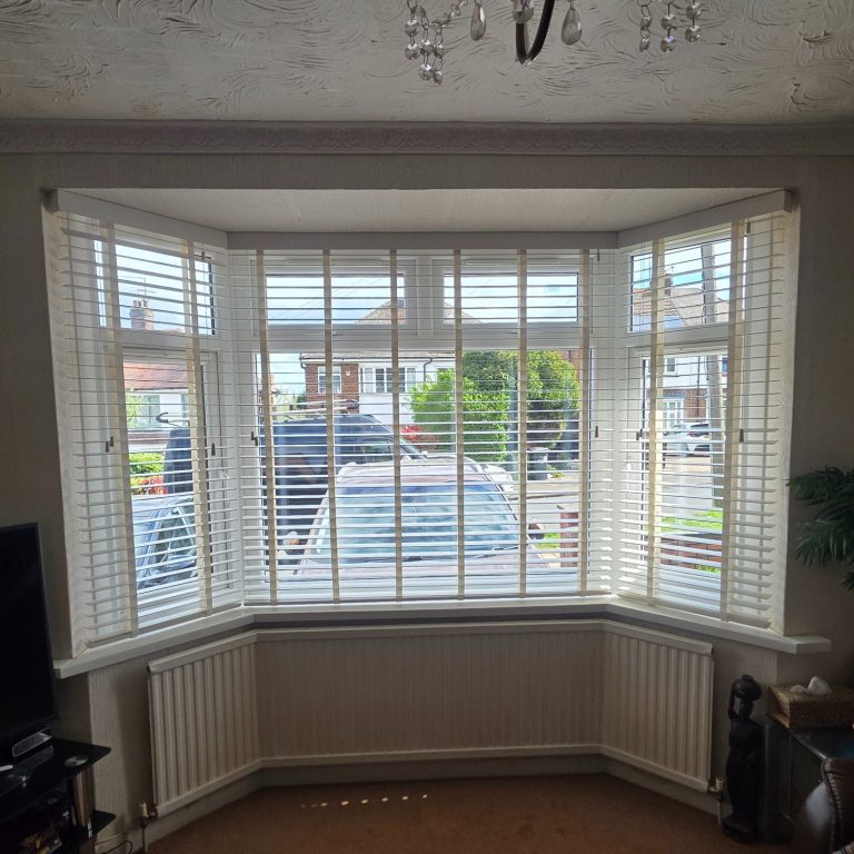 Made to measure Venetian blinds in a bay window Made to measure Venetian blinds expertly installed into a bay window by TrueShade Interiors