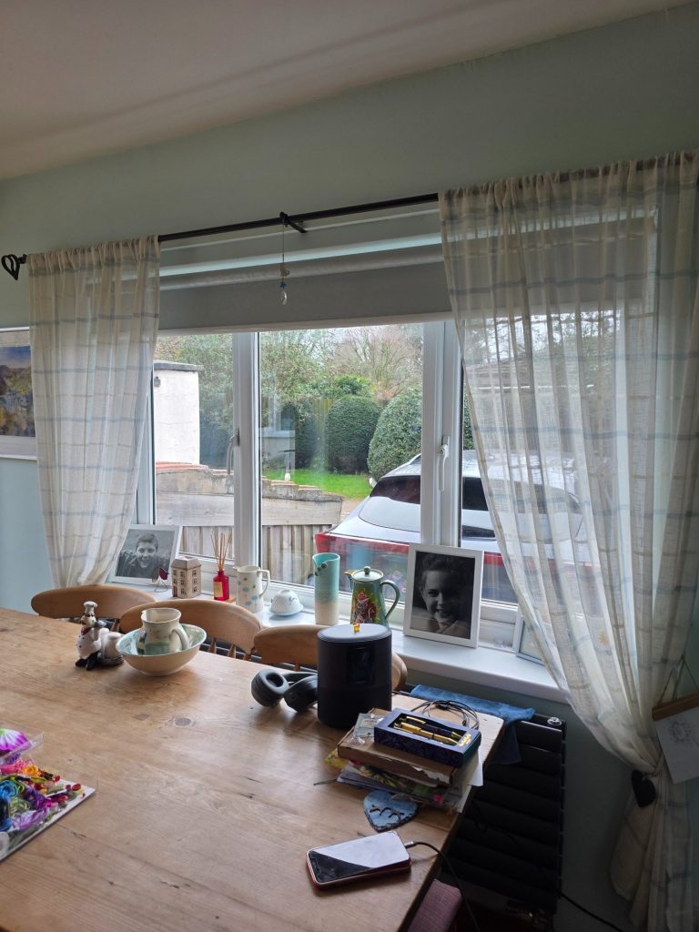 Motorised blind for dining room Motorised blind fitted to a dining room window for convenient privacy, glare reduction and smooth remote control