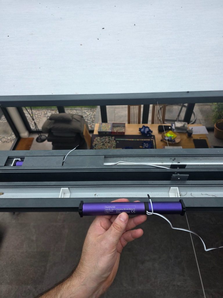 Roof Lantern Blind Motor Replacement | TrueShade Interiors Replacement tubular motor with built-in receiver being fitted to an existing motorised roof lantern blind during repair.
