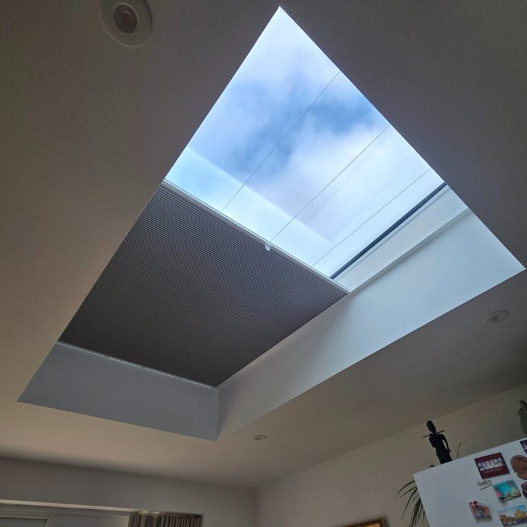 Made to measure skylight blind Made to measure skylight blind to tackle heat loss and heat gain installed by TrueShade Interiors