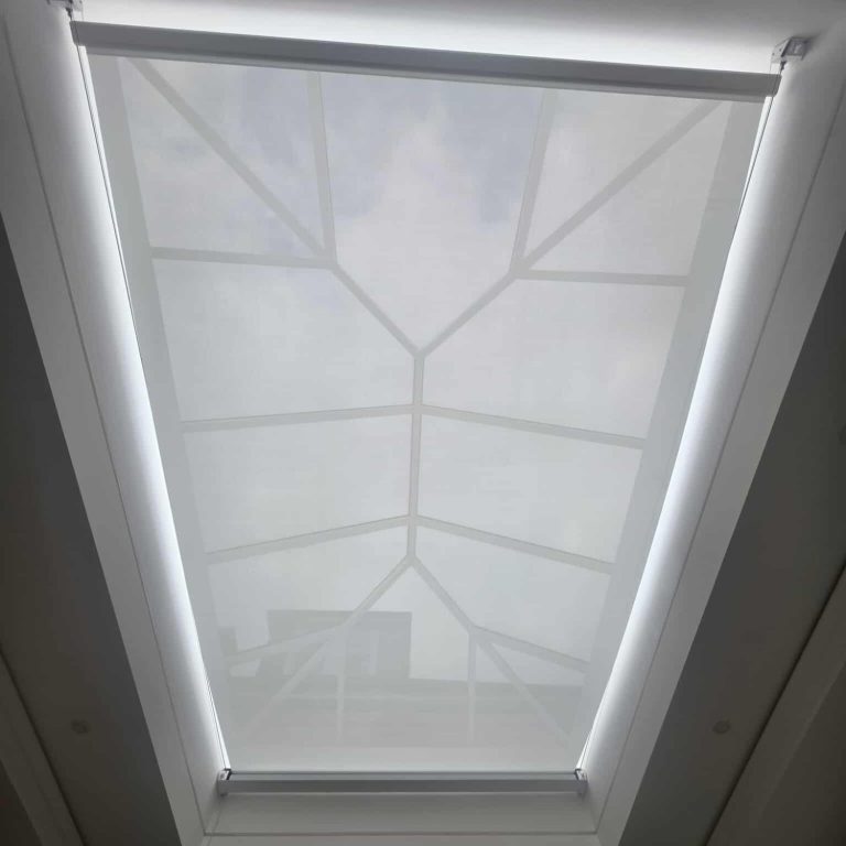 Made to measure smart motorised Somfy tensioned roller blinds Made to measure motorised dry contact Somfy tensioned roller blinds installed by TrueShade Interiors