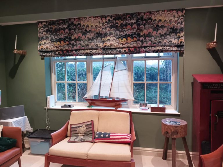 Made to measure roman blinds Made to measure roman blinds neatly fitted to a feature window