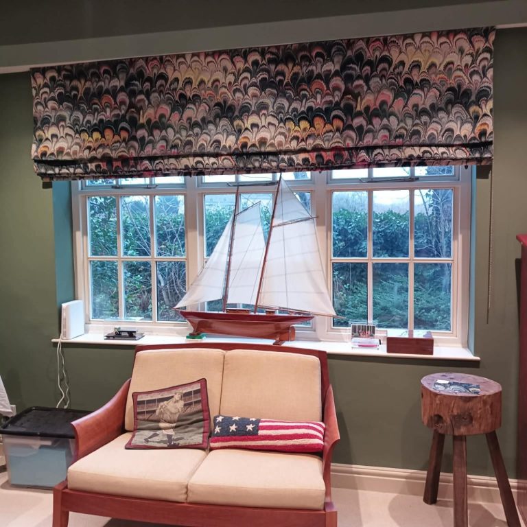 Made to measure roman blind Made to measure roman blinds installed in a feature window by TrueShade Interiors
