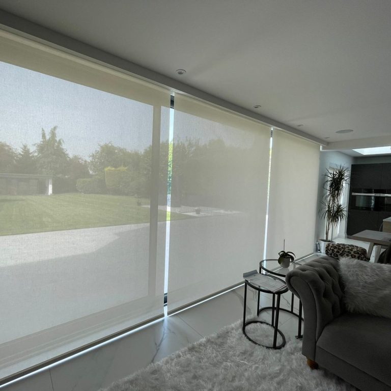 Lutron smart blind installation Lutron motorised blinds installed in a modern open plan home for discreet smart control of light, privacy and comfort