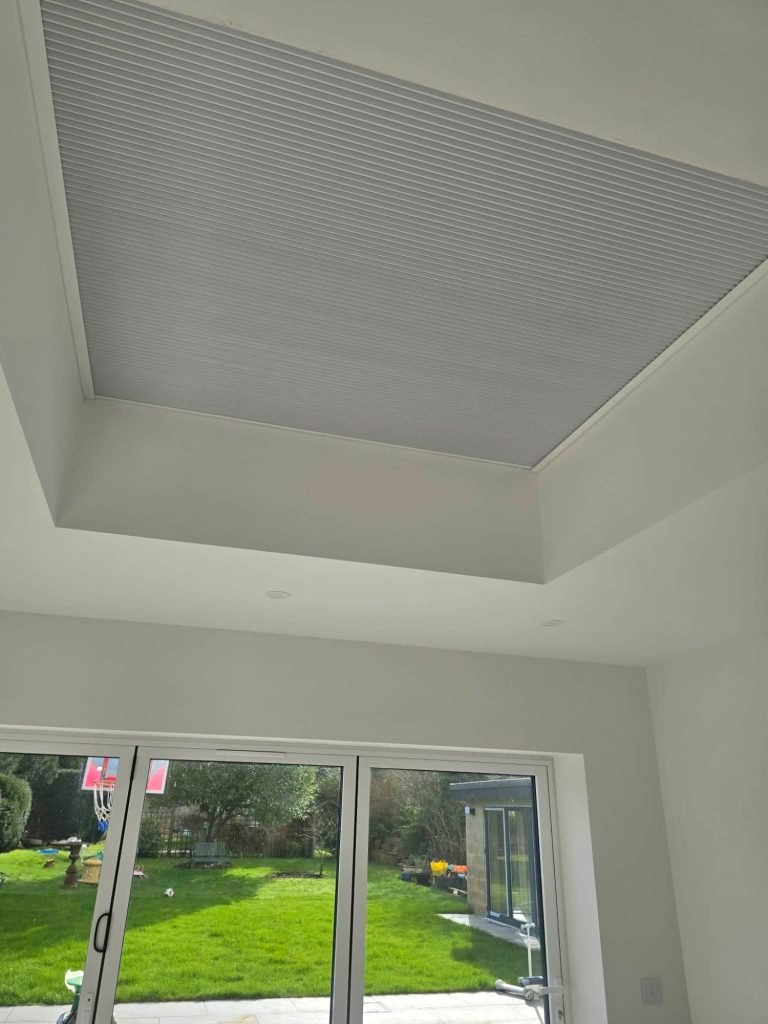 Blackout thermal skylight blind Made to measure blackout thermal honeycomb blind fitted neatly within a skylight recess for blackout performance and heat reduction