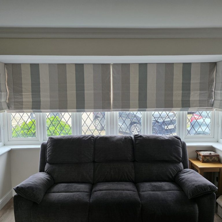 Roman blinds for bay windows Made to measure roman blinds installed in a bay window by TrueShade Interiors