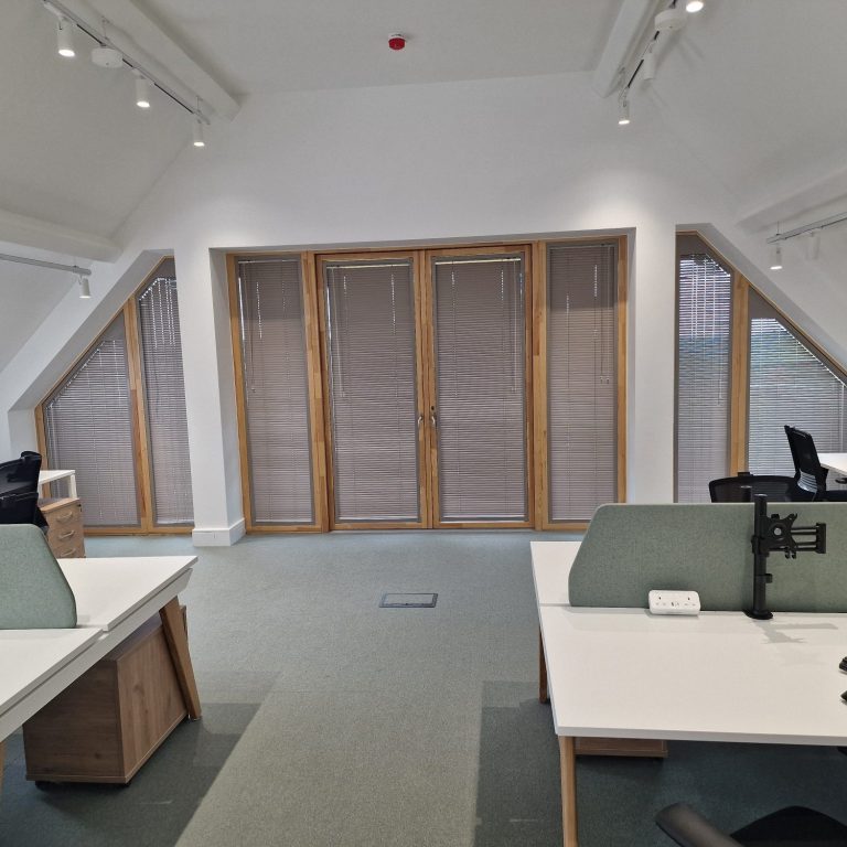 Shaped aluminium 25mm blind Expertly measured bespoke shaped aluminium blinds installed by TrueShade Interiors