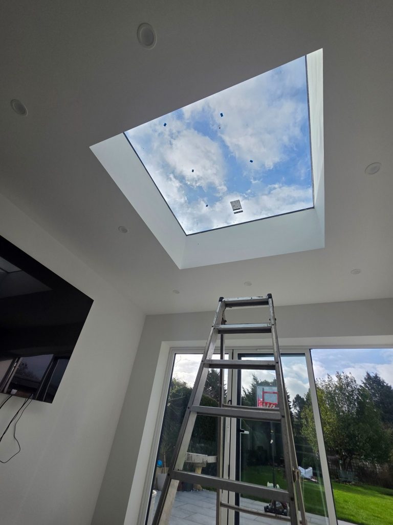 Skylight blackout blind installation Skylight opening prepared for a made to measure blackout thermal honeycomb blind installation in a modern extension